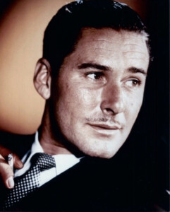 Errol Flynn, c.1940. Image in the public domain.